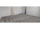 Spacious bedroom with neutral carpet and multiple doors at 281 Chesapeake Commons St # 95, Garner, NC 27529