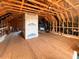 Spacious unfinished attic with exposed beams, ready to be transformed at 374 W Falcon Ct, Clayton, NC 27520