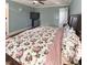Large main bedroom suite featuring a ceiling fan, tv and king sized bed at 374 W Falcon Ct, Clayton, NC 27520