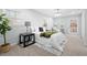 Relaxing bedroom with natural light, a comfortable bed, and a cozy atmosphere, perfect for unwinding at 6512 Johnsdale Rd, Raleigh, NC 27615