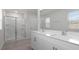 Main bathroom with double vanity and shower at 70 Scenic Rock Dr, Youngsville, NC 27596