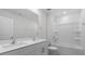 Bathroom with double vanity, shower, and bathtub at 70 Scenic Rock Dr, Youngsville, NC 27596