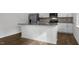 Kitchen features granite countertops and white cabinets at 70 Scenic Rock Dr, Youngsville, NC 27596