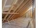 Unfinished attic space showing exposed wood beams and framing at 734 S State St, Raleigh, NC 27601