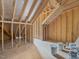 Unfinished attic space showing exposed wood beams and framing at 734 S State St, Raleigh, NC 27601