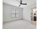 Bright bedroom with a ceiling fan and natural light, creating a comfortable and airy space at 734 S State St, Raleigh, NC 27601