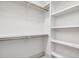 Well-organized closet with shelving and rods, offering ample storage space at 734 S State St, Raleigh, NC 27601