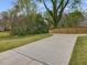 Long, modern concrete driveway with ample space, perfect for multiple vehicles at 734 S State St, Raleigh, NC 27601