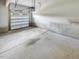 Spacious two car garage with concrete floor and automatic garage door at 734 S State St, Raleigh, NC 27601