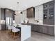 Stunning kitchen boasts an island with seating and stainless appliances at 734 S State St, Raleigh, NC 27601