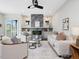 Bright living room with fireplace and plenty of natural light at 734 S State St, Raleigh, NC 27601