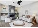 Comfortable living room with fireplace and a ceiling fan at 734 S State St, Raleigh, NC 27601
