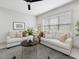 Inviting living room featuring comfortable sofas, stylish tables, and a serene ambiance at 734 S State St, Raleigh, NC 27601