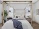 Comfortable main bedroom featuring a stylish bed, bedside tables, and neutral decor at 734 S State St, Raleigh, NC 27601