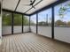 Inviting porch with wood flooring and a scenic view of the outdoors at 734 S State St, Raleigh, NC 27601