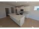 Beautiful kitchen with white cabinets, quartz countertops, and stainless steel appliances at 8 Steppe Way, Garner, NC 27529