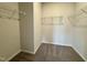 Spacious walk-in closet with ample shelving space for organization at 108 Commons Circle # 228, Clayton, NC 27520