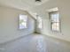 Bedroom with bright natural light from the windows, perfect for creating a cozy and inviting space at 1721 Burnette Garden Path, Raleigh, NC 27612