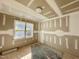 A bedroom that is under construction with the drywall being mudded at 1721 Burnette Garden Path, Raleigh, NC 27612