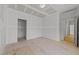A room under construction with a doorway to another room awaits customization to create the perfect living space at 1721 Burnette Garden Path, Raleigh, NC 27612