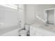 Pristine white bathroom with tub/shower combo, vanity, and ample natural light for a spa-like retreat at 211 Pond View Ct # 5, Fuquay Varina, NC 27526