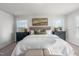 Spacious bedroom with a comfortable bed, stylish furniture, and sun-drenched windows at 211 Pond View Ct # 5, Fuquay Varina, NC 27526