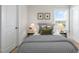 Cozy bedroom with natural light, featuring a comfortable bed and classic decor at 211 Pond View Ct # 5, Fuquay Varina, NC 27526