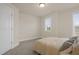 Neutral bedroom with a window with natural light at 211 Pond View Ct # 5, Fuquay Varina, NC 27526