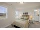 Cozy bedroom with neutral tones, natural light, and ensuite bathroom at 211 Pond View Ct # 5, Fuquay Varina, NC 27526