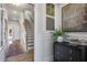 Inviting entryway with stairs, stylish decor, and wood floors create a warm welcome to this beautiful home at 211 Pond View Ct # 5, Fuquay Varina, NC 27526