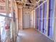 Unfinished interior showing exposed framing, electrical wiring, and the house layout at 211 Pond View Ct # 5, Fuquay Varina, NC 27526