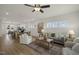 Open-concept living space featuring a cozy living room, a dining area with a table, and modern decor at 211 Pond View Ct # 5, Fuquay Varina, NC 27526