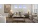 Spacious living room with comfortable seating, modern decor, and natural light offers a welcoming gathering space at 211 Pond View Ct # 5, Fuquay Varina, NC 27526
