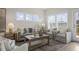 Inviting living room with plush seating, neutral decor, and abundant natural light creates a relaxing atmosphere at 211 Pond View Ct # 5, Fuquay Varina, NC 27526