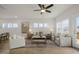 Bright and airy living room with stylish furniture, neutral tones, and abundant natural light for relaxation at 211 Pond View Ct # 5, Fuquay Varina, NC 27526