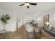Spacious open-concept area with living room, dining area, and staircase, offering a modern, airy design at 211 Pond View Ct # 5, Fuquay Varina, NC 27526