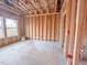 Unfinished room with exposed framing and visible electrical at 211 Pond View Ct # 5, Fuquay Varina, NC 27526