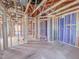 Unfinished interior featuring wood framing, exposed ductwork, ready for personalized design and finishing touches at 211 Pond View Ct # 5, Fuquay Varina, NC 27526