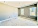 Comfortable bedroom with neutral walls and windows with view of the outside at 2624 Silver Gate Ct, Wake Forest, NC 27587