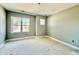 Neutral bedroom with ample natural light, featuring large windows at 2624 Silver Gate Ct, Wake Forest, NC 27587