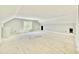 This versatile bonus room features neutral walls and ample space for customization at 2624 Silver Gate Ct, Wake Forest, NC 27587