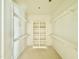 Spacious walk-in closet with built-in shelving offers ample storage space at 2624 Silver Gate Ct, Wake Forest, NC 27587