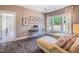 Office space with hardwood floors, desk, chair, chaise lounges, and bright window views at 3177 Armeria Dr, Apex, NC 27502