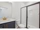 Modern bathroom with sleek black framed shower glass door, vanity and gold fixtures at 3301 Oakfields Rd # 2, New Hill, NC 27562