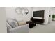 Small sitting area with sofa and media at 4043 Elk Creek Ln # 15, Raleigh, NC 27612
