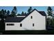 Side view of home with white siding, a black roof, trimmed windows, and an attached two car garage at 60 Chestnut Oak Dr, Youngsville, NC 27596
