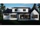 Rear of a modern home featuring white siding, black accents, and a sunroom with an outdoor seating area at 60 Chestnut Oak Dr, Youngsville, NC 27596