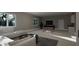 Spacious living room with modern furniture and a foosball table at 60 Chestnut Oak Dr, Youngsville, NC 27596