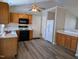 Functional kitchen featuring wood cabinets, great appliances, and nice lighting at 113 S Friars Chase Ln, Fuquay Varina, NC 27526
