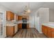 Bright kitchen with wood cabinets, modern appliances, and ample counter space at 113 S Friars Chase Ln, Fuquay Varina, NC 27526